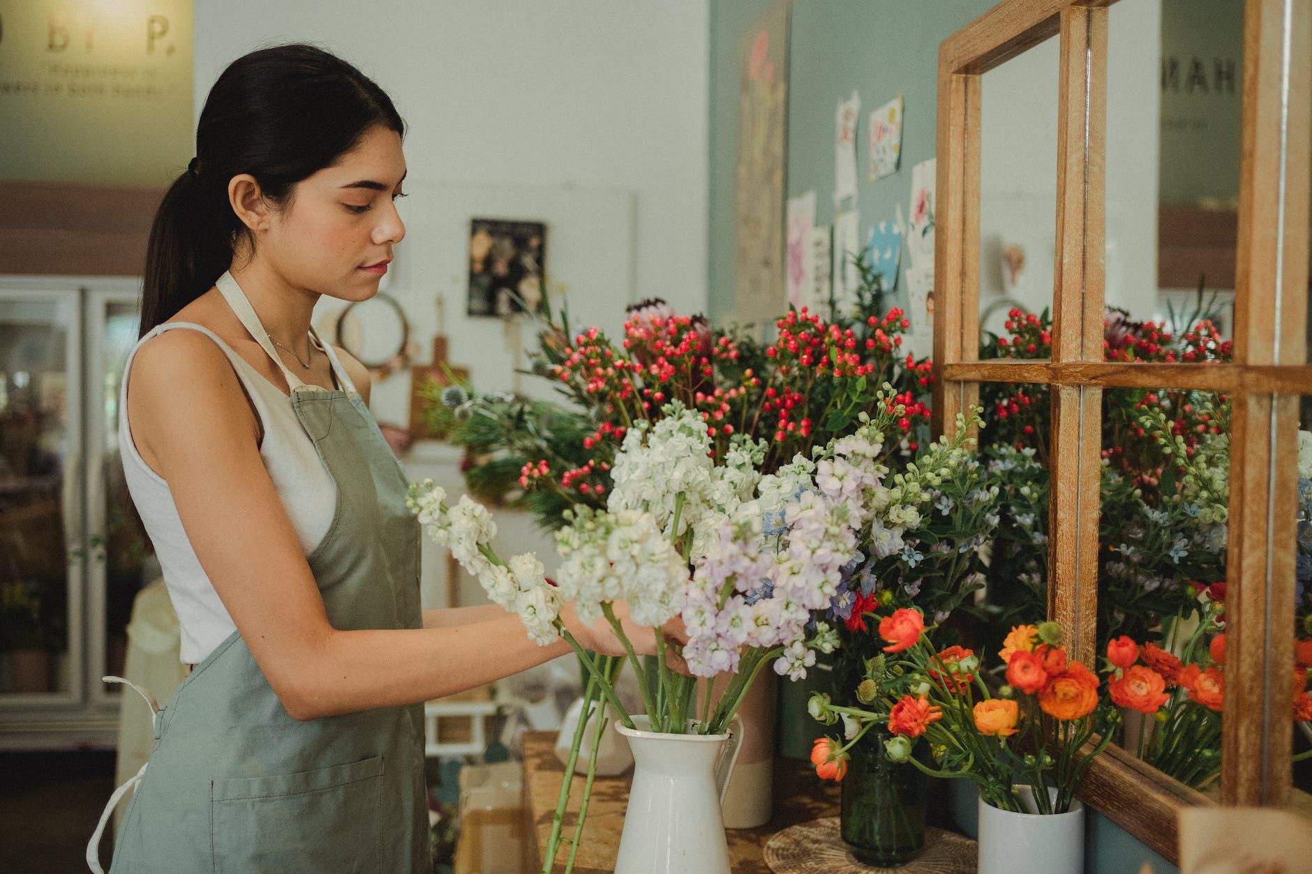 young woman working in flower shop